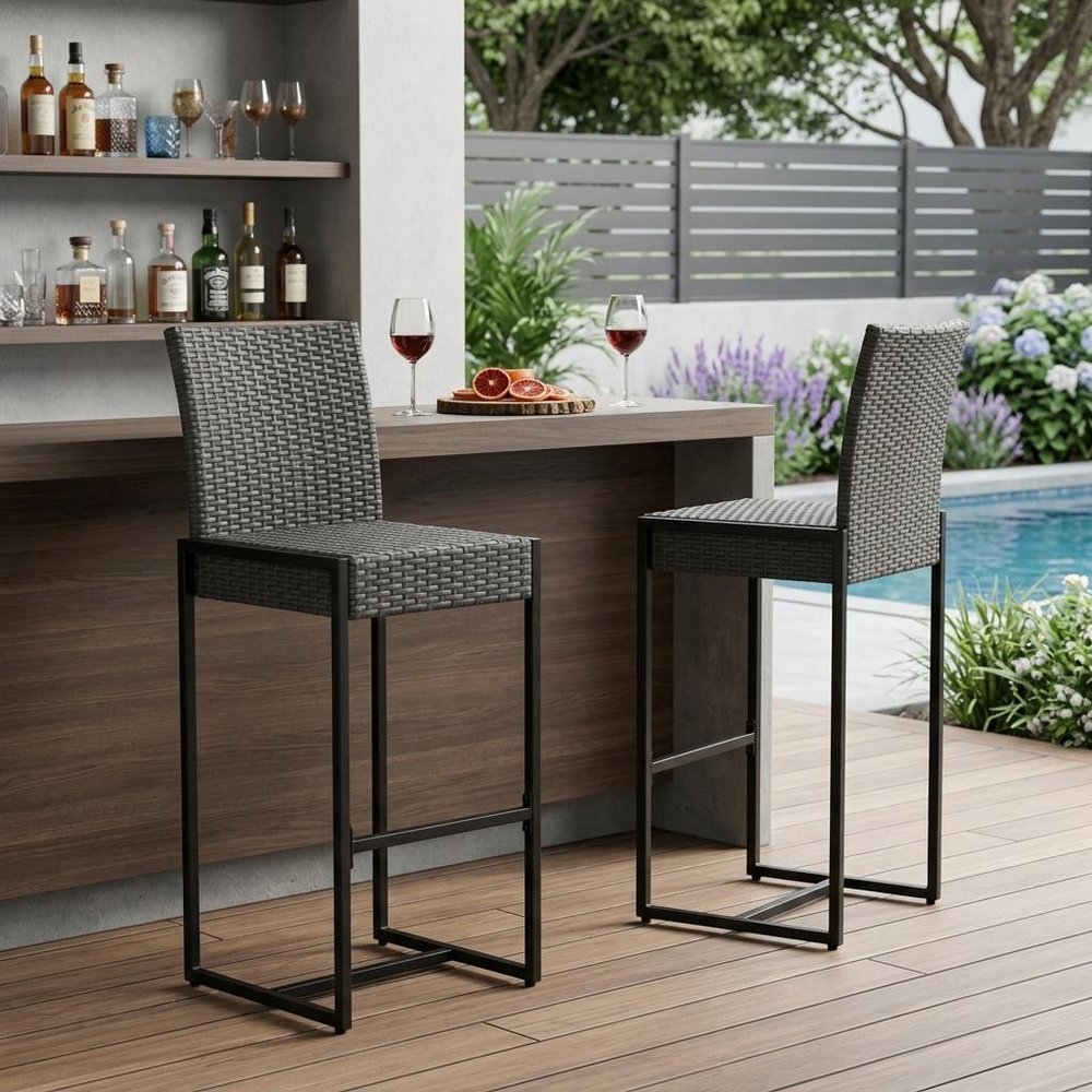 Set of Two 30" Gray Iron Outdoor Bar Height Chairs in a home interior