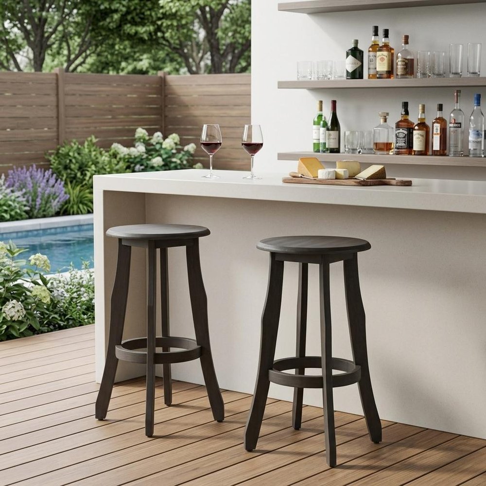 Set of Two 30" Dark Gray Solid Wood Backless Outdoor Bar Height Chairs in a home interior