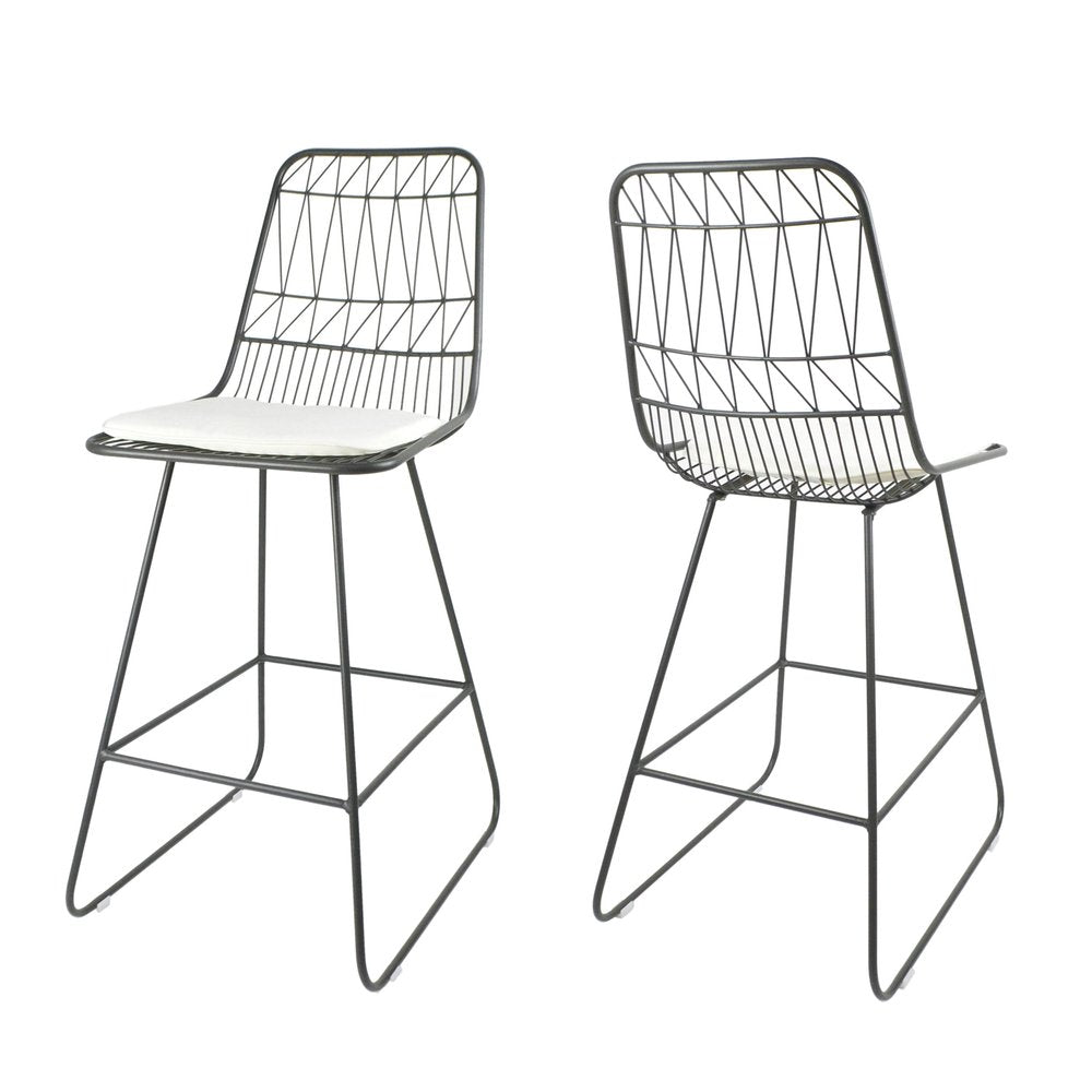 Two gray iron bar height chairs with ivory cushions on a white background.