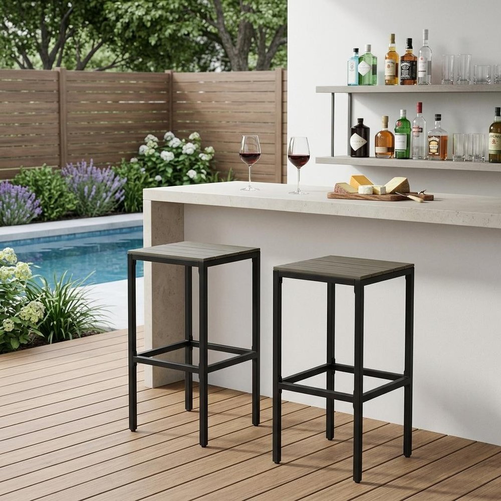 Set of Two 30" Gray Solid Wood Backless Outdoor Bar Height Chairs in a home interior