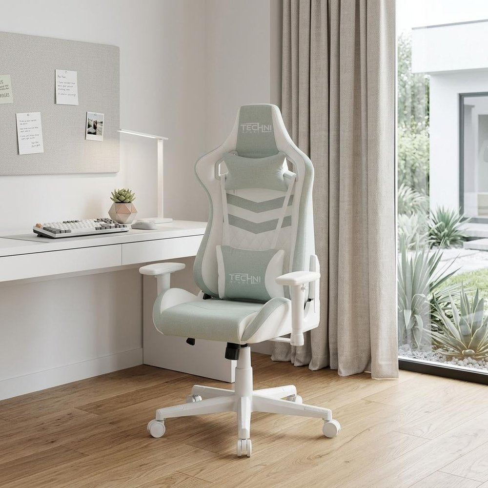 Mint Green And White Adjustable Height Swivel Rolling Gaming Chair in a home interior