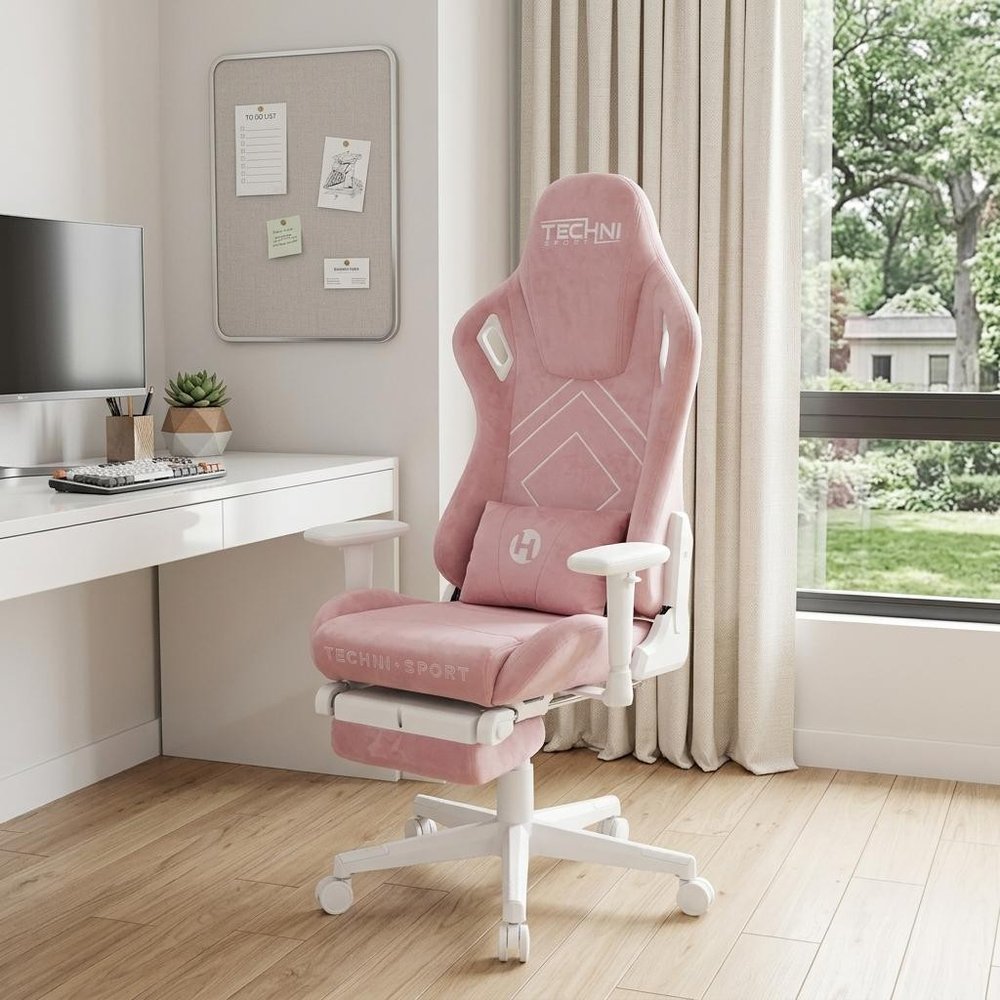 Pink And White Adjustable Height Swivel Rolling Gaming Chair in a home interior