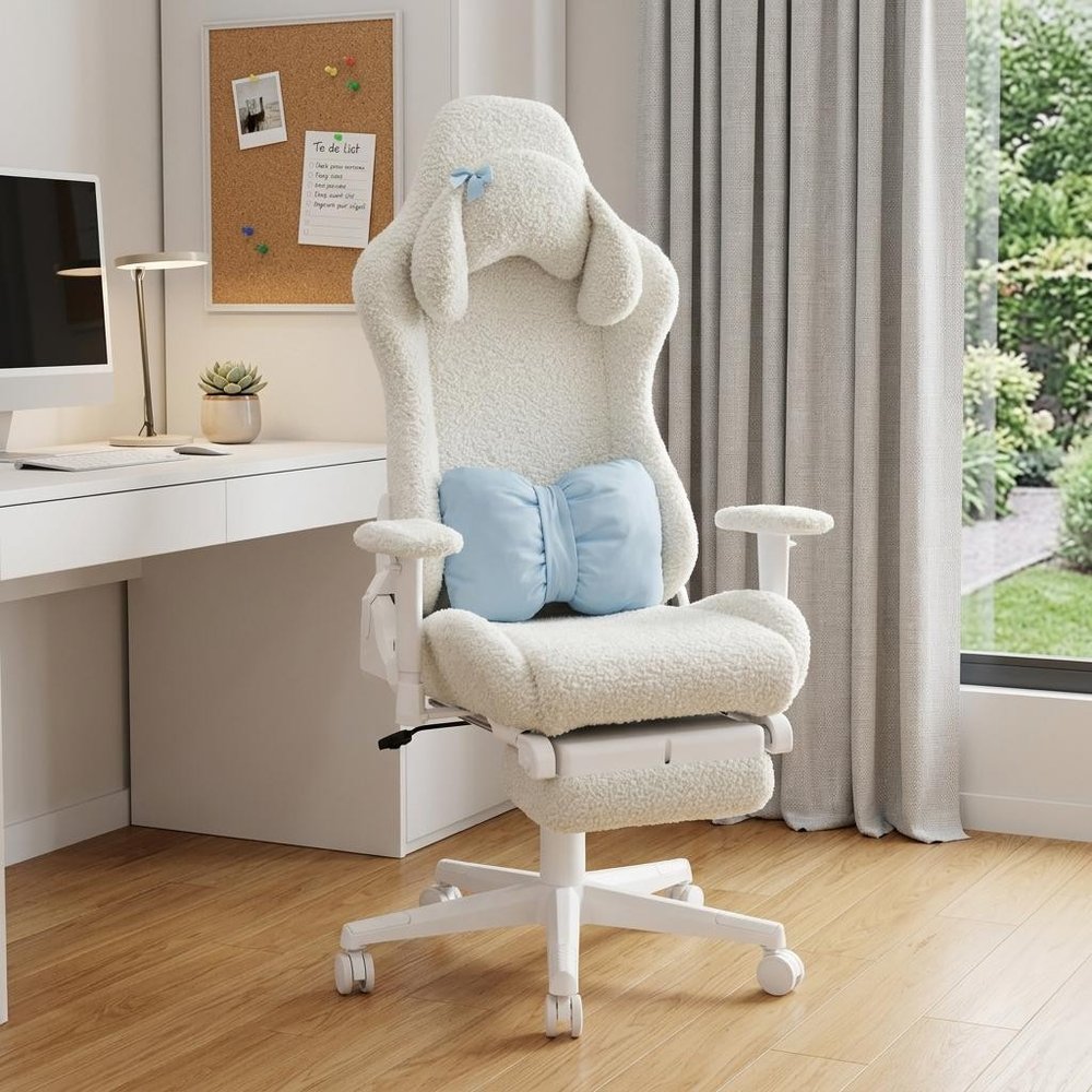 White Adjustable Height Swivel Rolling Gaming Chair With Footrest in a home interior