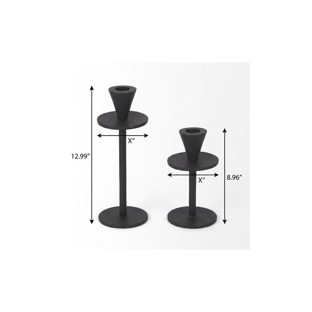 Set of Two Black Metal Floor Taper Candlesticks on a white background