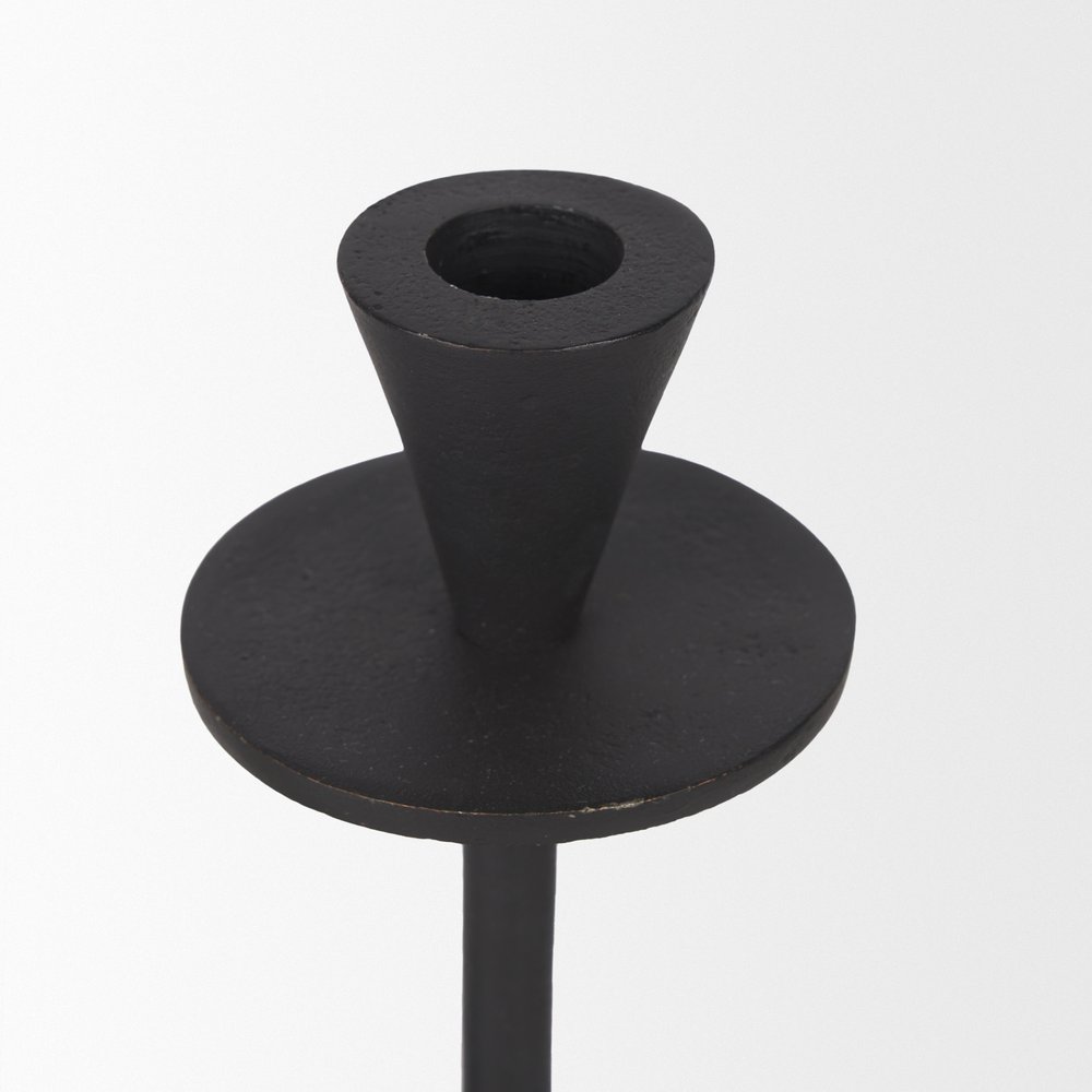 Set of Two Black Metal Floor Taper Candlesticks on a white background