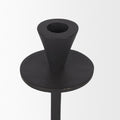 Set of Two Black Metal Floor Taper Candlesticks on a white background