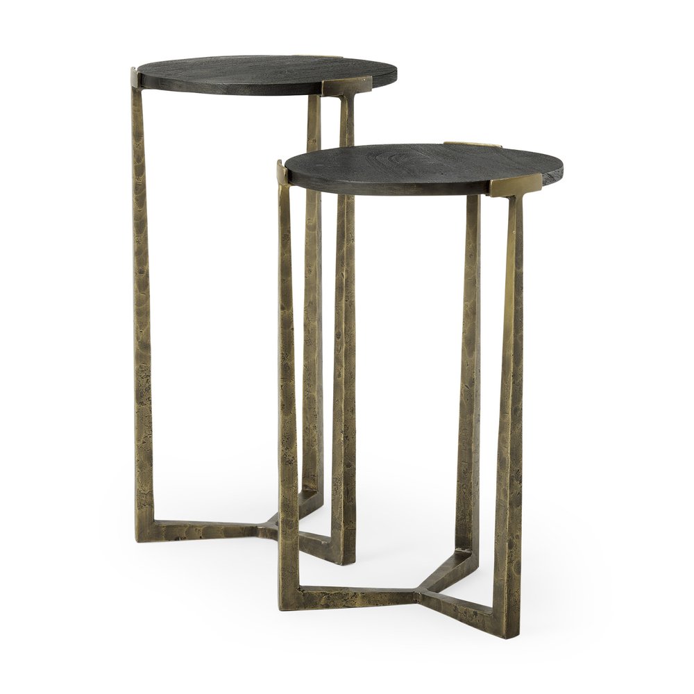 Set of Two Black and Antiqued Gold Distressed Solid Wood and Iron Round Cross Legs Nested Tables on a white background