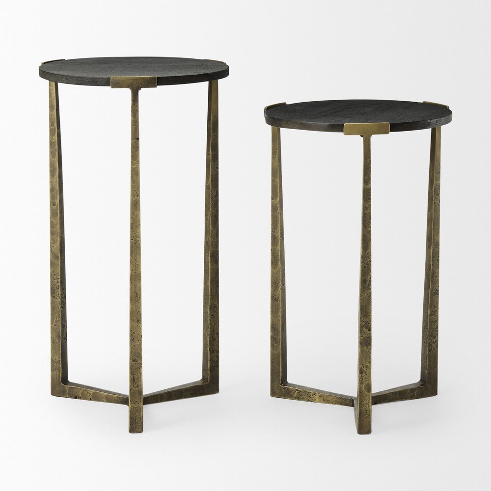 Set of Two Black and Antiqued Gold Distressed Solid Wood and Iron Round Cross Legs Nested Tables on a white background