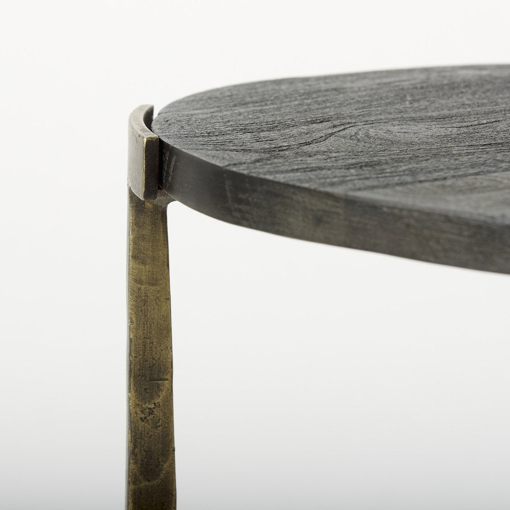 Set of Two Black and Antiqued Gold Distressed Solid Wood and Iron Round Cross Legs Nested Tables on a white background