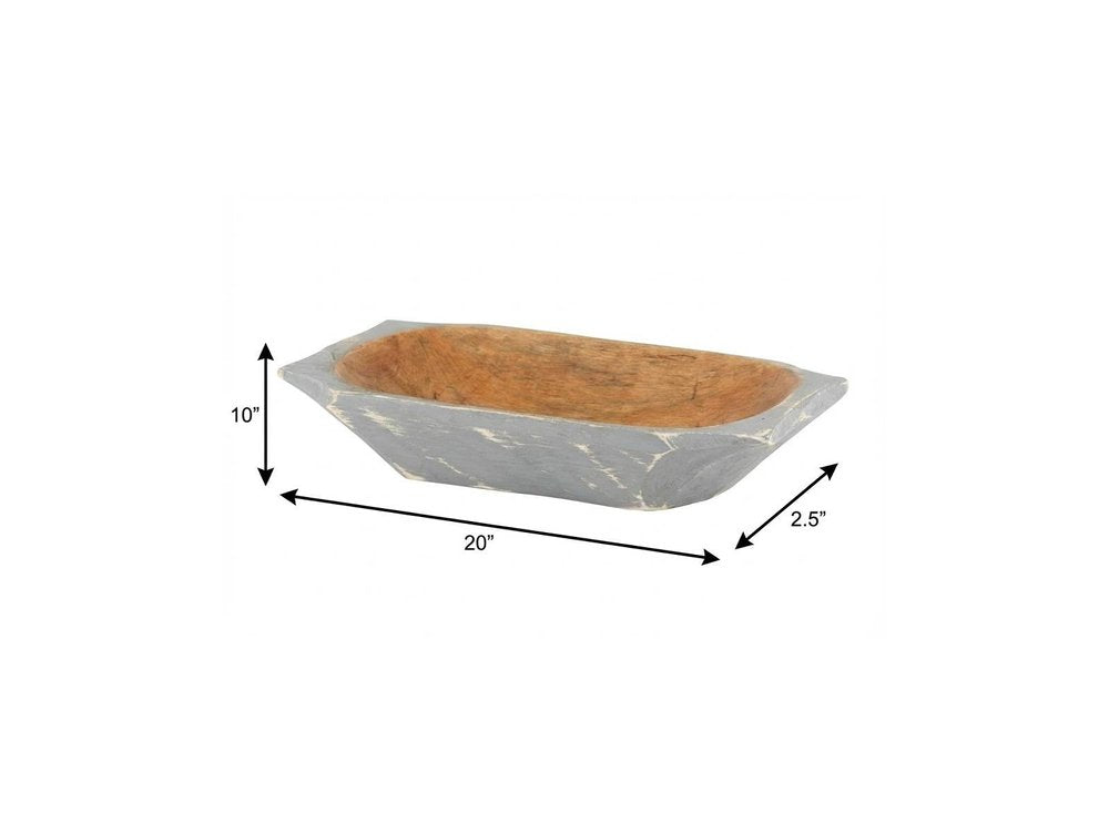 20" Black Solid Wood Dough Bowl With Handles. Serving bowl isolated on a plain white background, showing a wood surface.