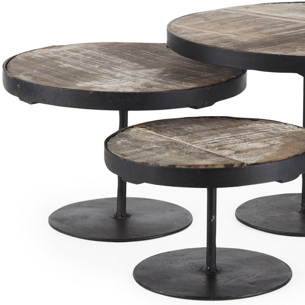 Set of Three Black And Light Brown Iron And Solid Wood Round Risers on a white background