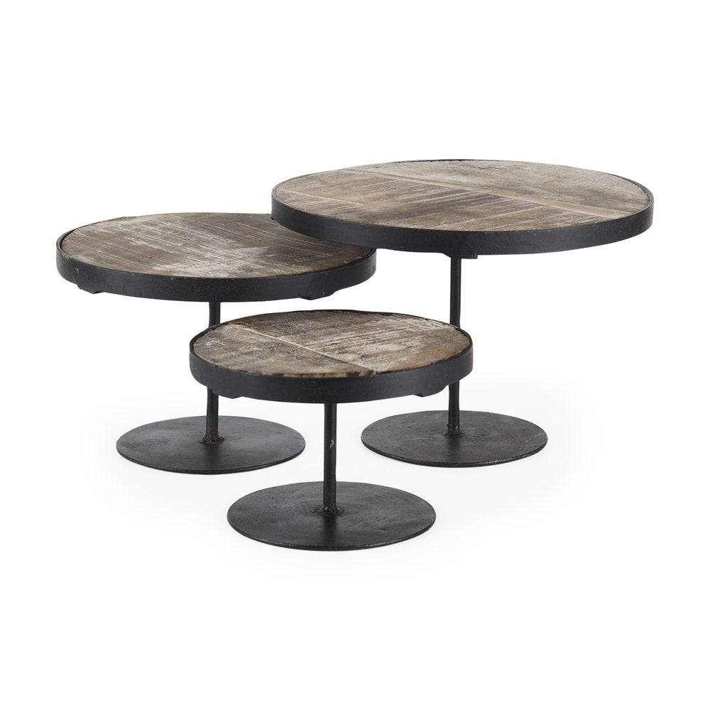 Set of three round risers with light brown wood tops and black iron bases on a white background.