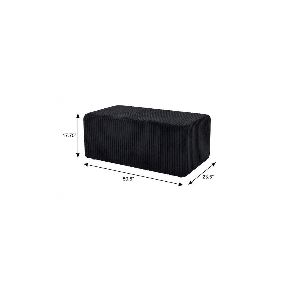 51" Black Corduroy Ottoman. Ottoman isolated on a plain white background, in a black finish.