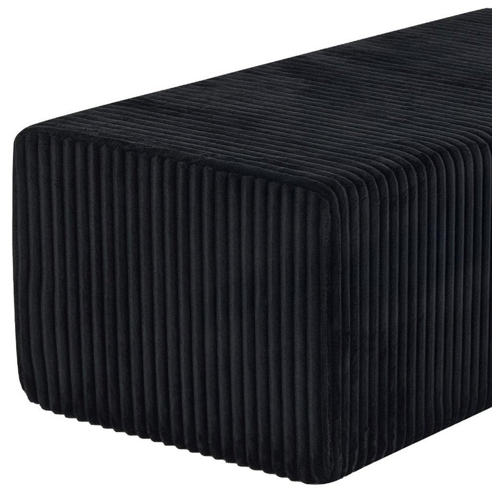 51" Black Corduroy Ottoman. Ottoman isolated on a plain white background, finished in black.