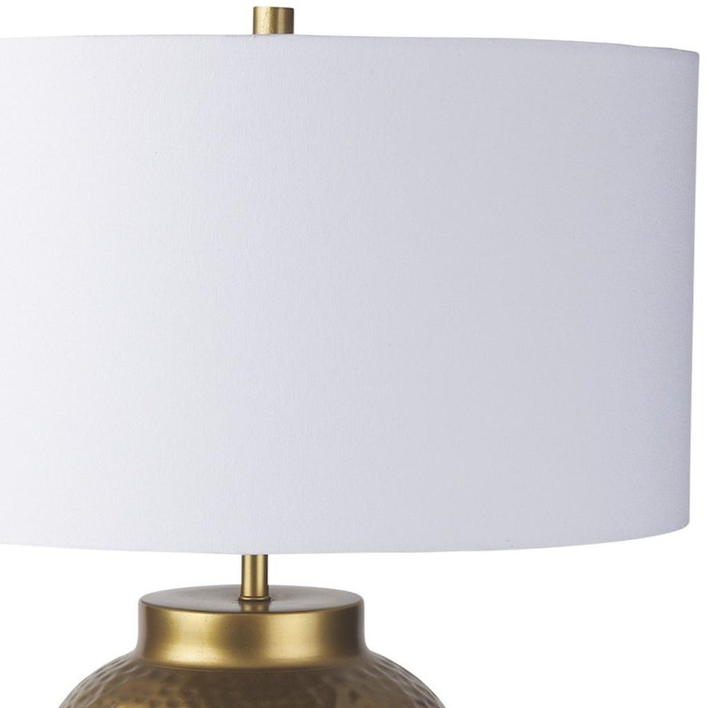 30" Gold Novelty Table Lamp With Drum Shade. Table lamp isolated on a plain white background.