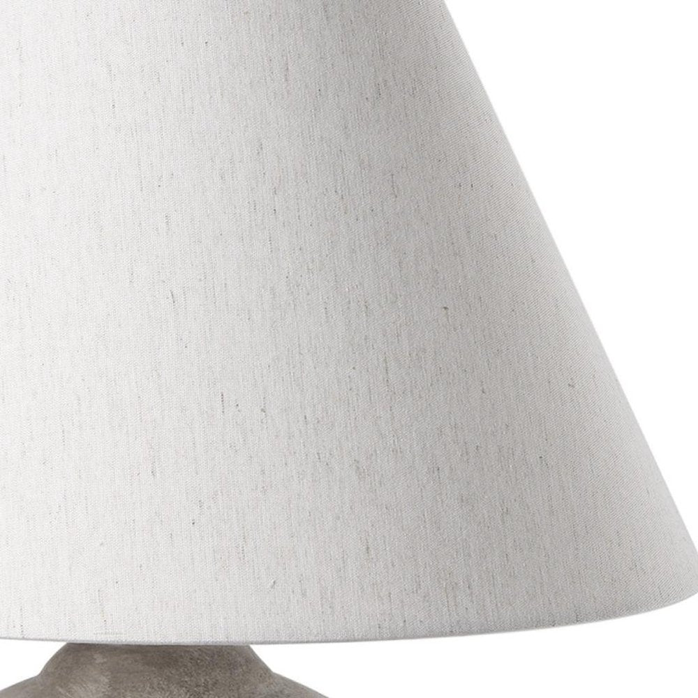 25" Tan Novelty Table Lamp With Bell Shade. Table lamp isolated on a plain white background, in a light gray finish.