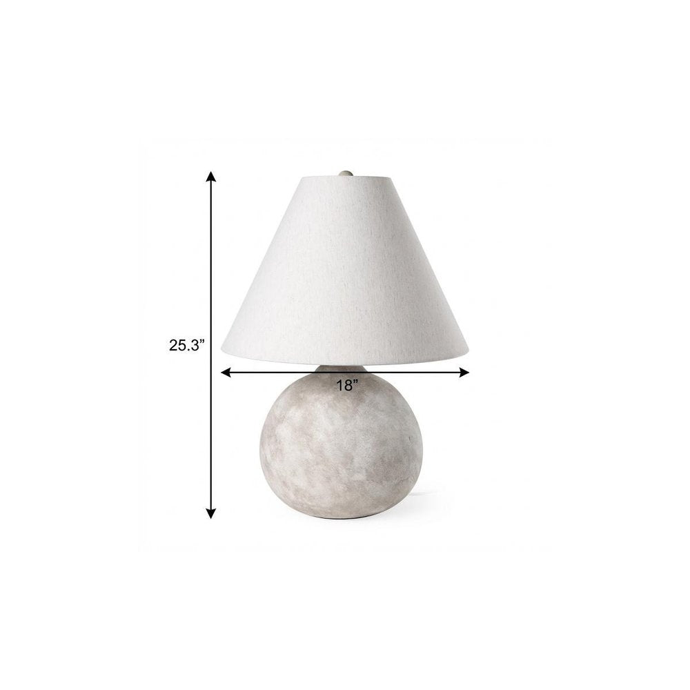 25" Tan Novelty Table Lamp With Bell Shade. Table lamp isolated on a plain white background, showing its light gray color.