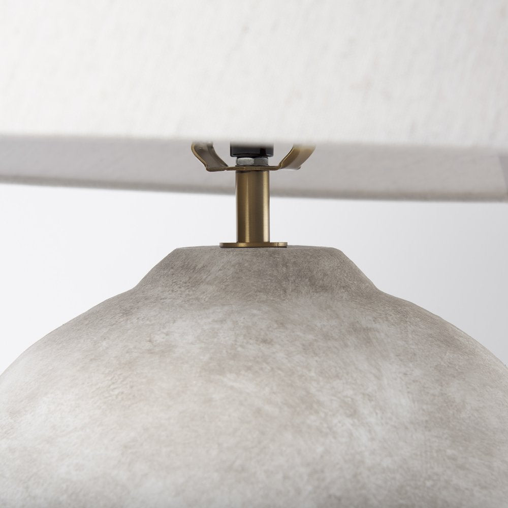 25" Tan Novelty Table Lamp With Bell Shade. Table lamp isolated on a plain white background, showing its light gray color.