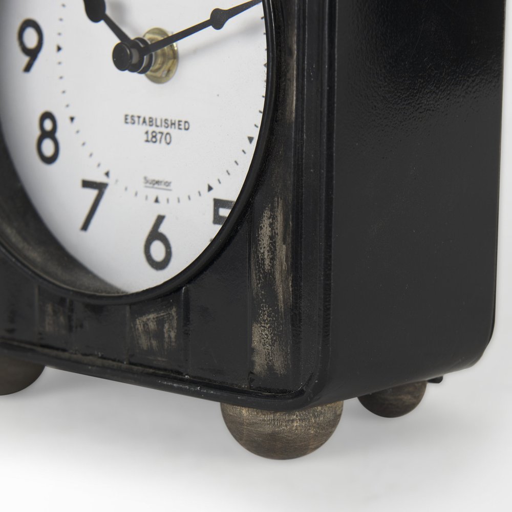 6" Black Metal Analog Round Wall Clock. Wall clock in black metal.