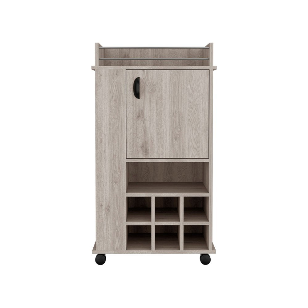 Gray wood bar cart with a cabinet, open shelves, and wheels against a white background.