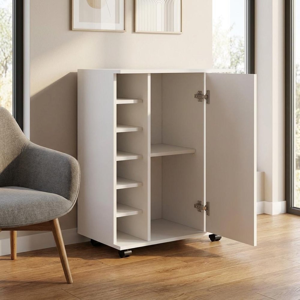 15" White Wood Bar Cart styled in a furnished interior with an off-white wall on a wood floor.