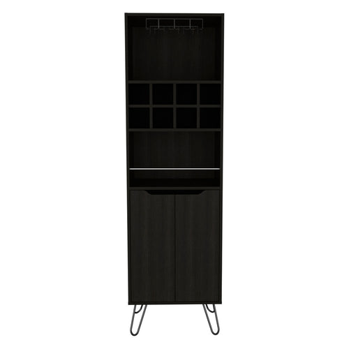 Black wood bar cart with wine glass rack, cubby shelves, and two doors on hairpin legs against a white background.