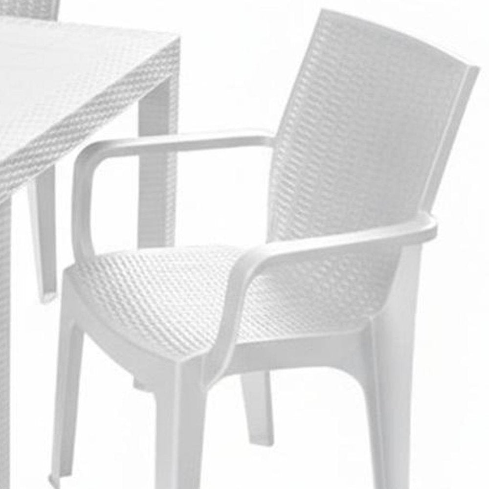 Seven Piece White Plastic Outdoor Patio Set With Table on a white background