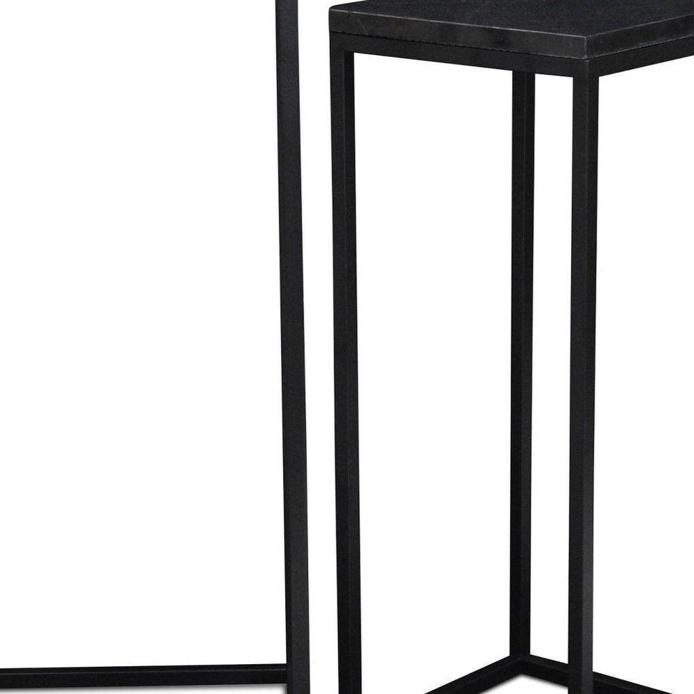 Set of Two Black Marble and Steel Square Frame Nested Tables on a white background