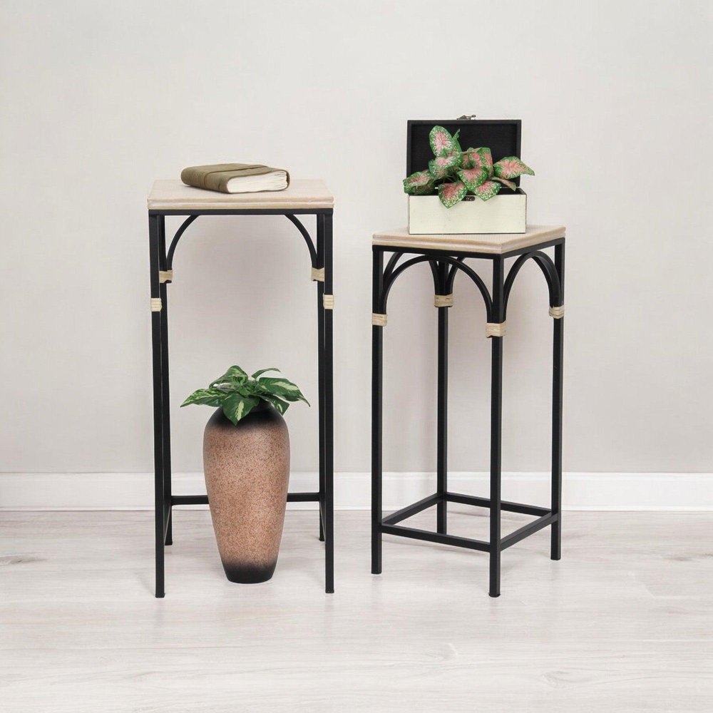 Set of Two Light Brown and Black Distressed Solid Wood and Steel Frame Nested Tables on a white background