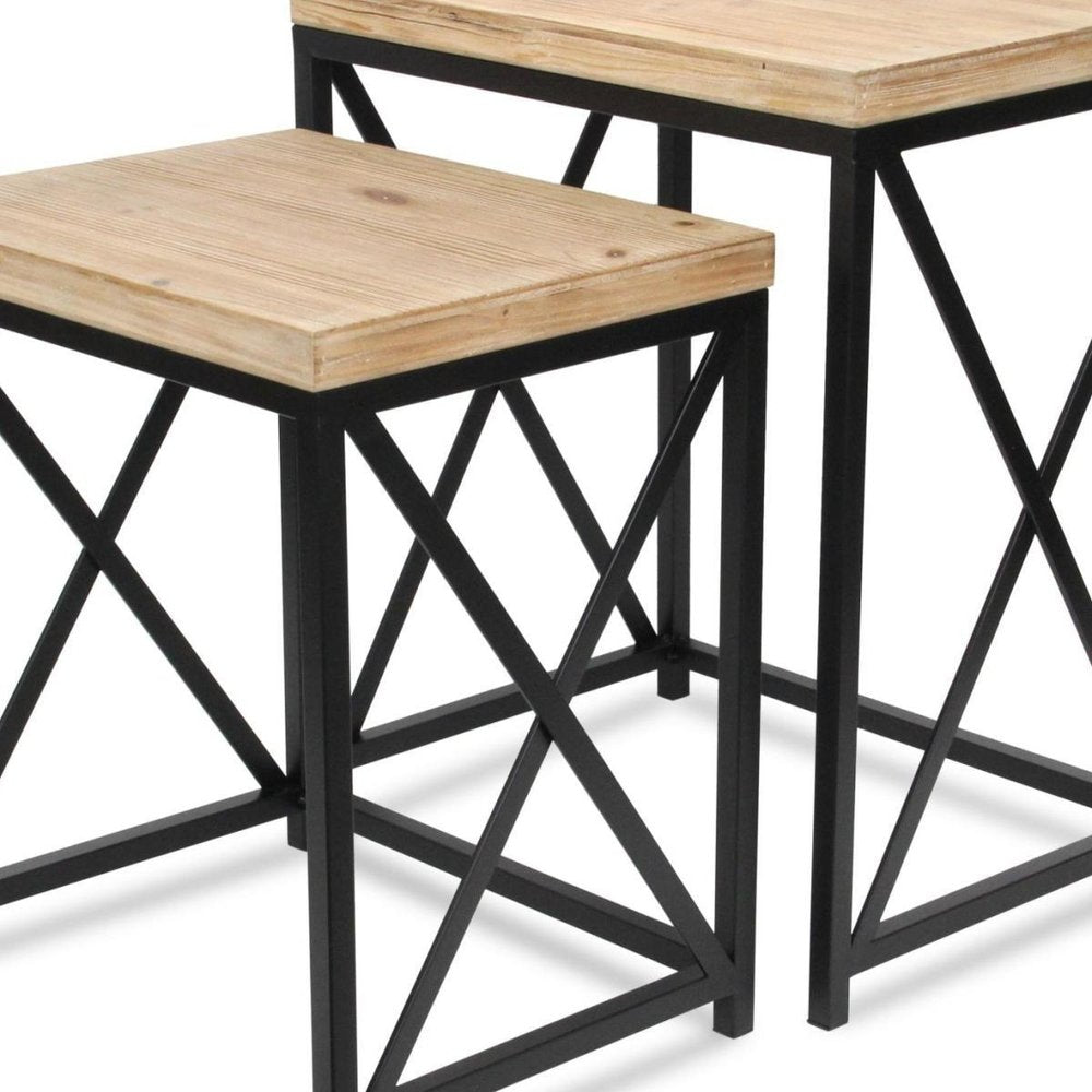 Set of Two Light Brown and Black Distressed Solid Wood and Steel Nested Tables on a white background