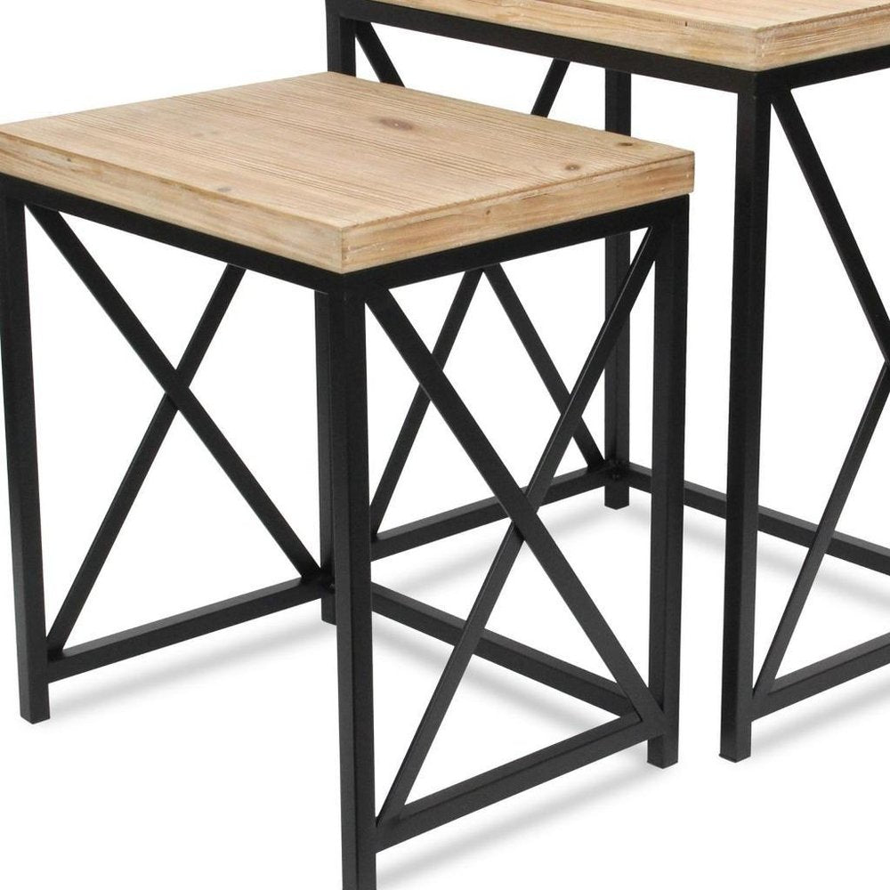 Set of Two Light Brown and Black Distressed Solid Wood and Steel Nested Tables on a white background