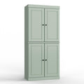 32" Sage Solid Wood Free Standing Four Door Linen Cabinet. Bathroom storage isolated on a plain white background, showing a wood surface.