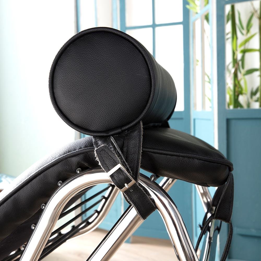 61" Black And Silver Leather and Metal Adjustable Lounge Chair With Pillow. Accent chair in black leather.