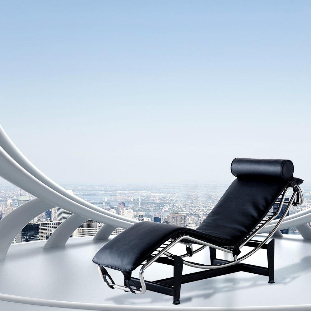 Detail view of 61" Black And Silver Leather and Metal Adjustable Lounge Chair With Pillow, filling the frame with the silver leather texture.