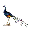 Metal peacock garden accent with iridescent purple and blue finish, standing on thin legs against a white background.
