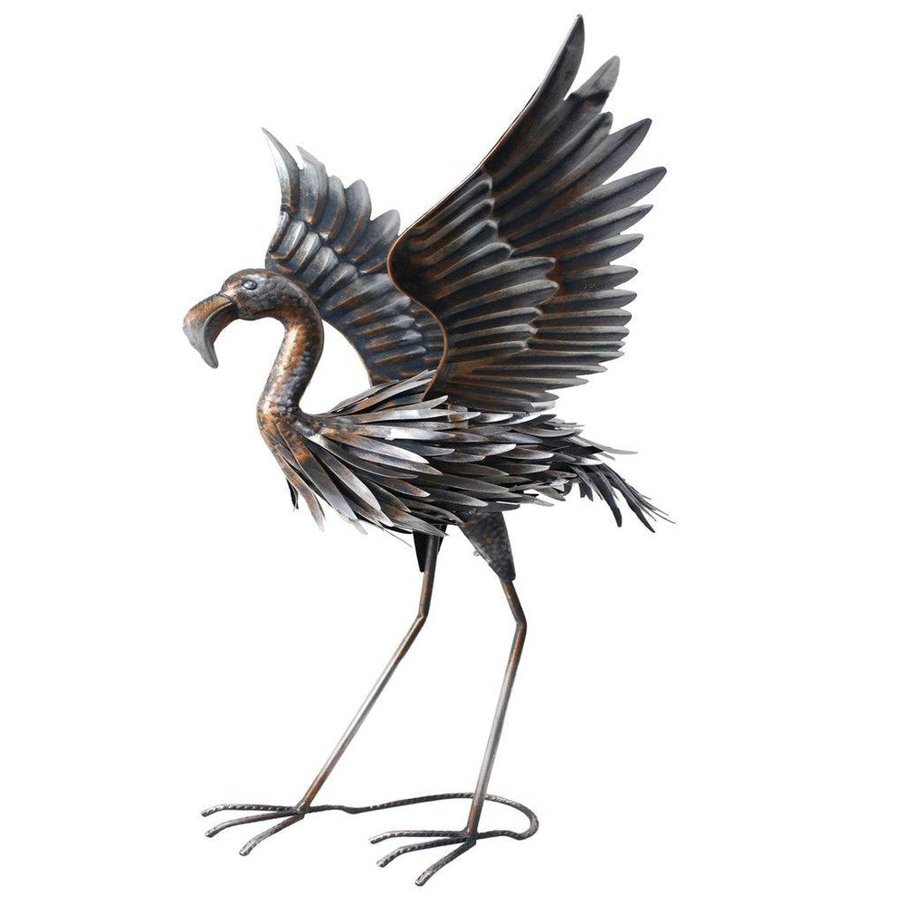 Copper and silver metal flamingo garden accent with wings spread, on a white background.