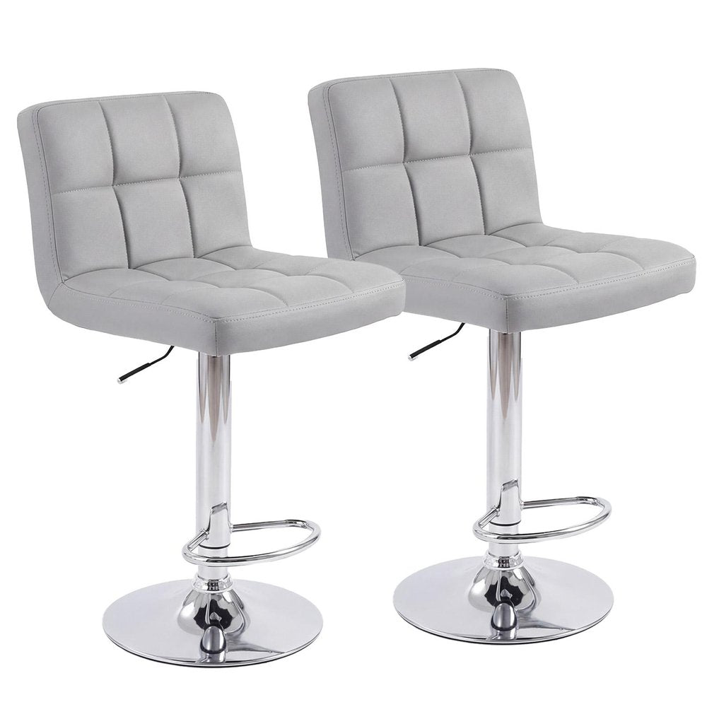 Two gray faux leather adjustable height swivel bar chairs with silver steel bases and footrests on a white background.