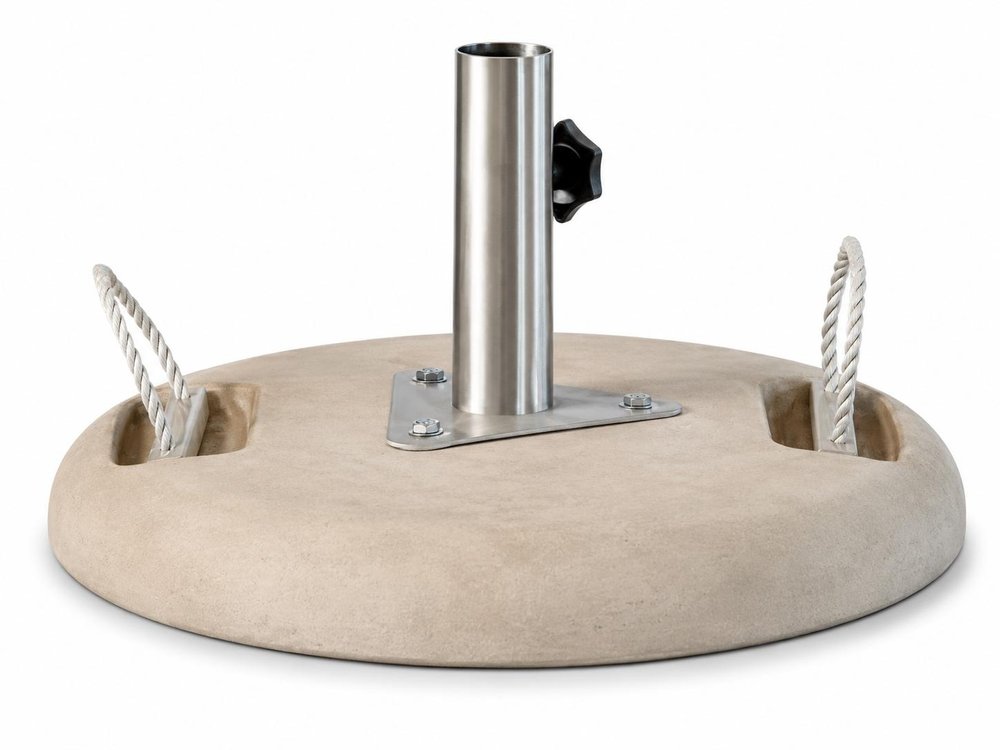 Concrete umbrella base in sand color with a silver pole and rope handles on a white background.