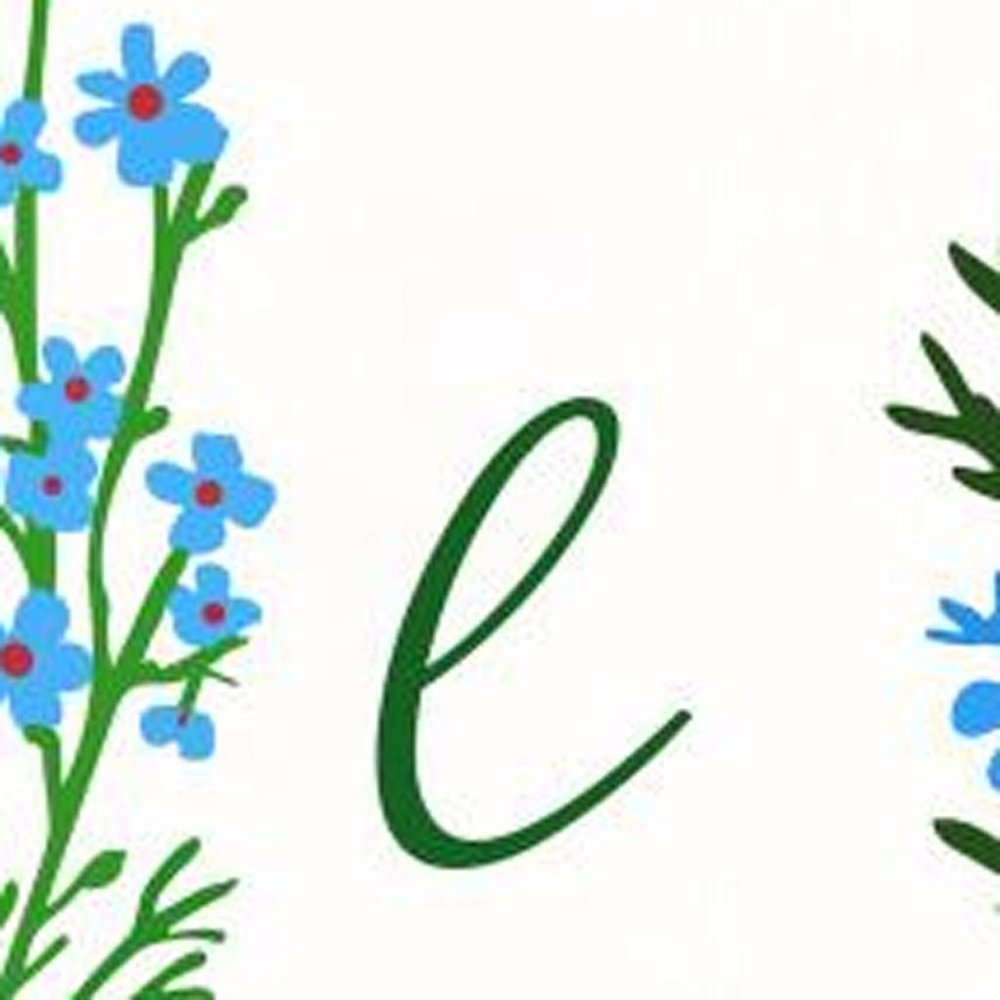 Green and white solid wood porch sign with a floral bouquet and the word "Hello" in cursive.