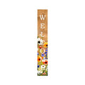 Vertical wooden porch sign with "WELCOME" in white letters and a floral design in green, white, and orange.