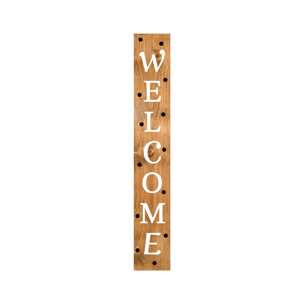 Vertical wooden porch sign with "WELCOME" in white letters against a natural wood background with black dots.