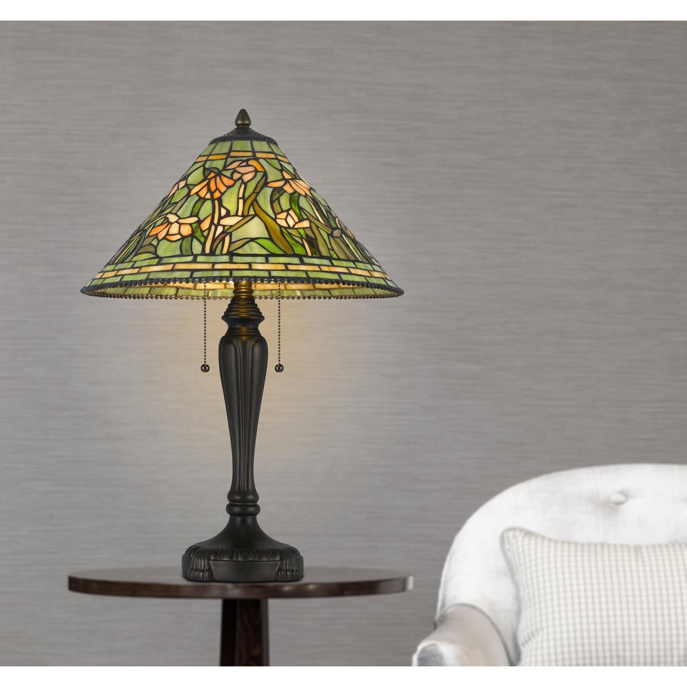 Cropped view of 24" Bronze Flowers Two Light Round Tiffany Lamp With Dome Shade focusing on the surface surface.