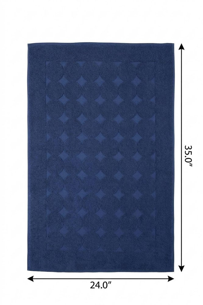 24" X 35" White Tone on Tone Polka Dot Turkish Cotton Bath Rug. Bath rug isolated on a plain white background, in a white cotton finish.