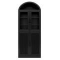 76" Black Wood Four Door Pantry Or Storage Closet. Pantry cabinet photographed on a plain white background in a matte black finish, with an arched open top and glass upper doors.