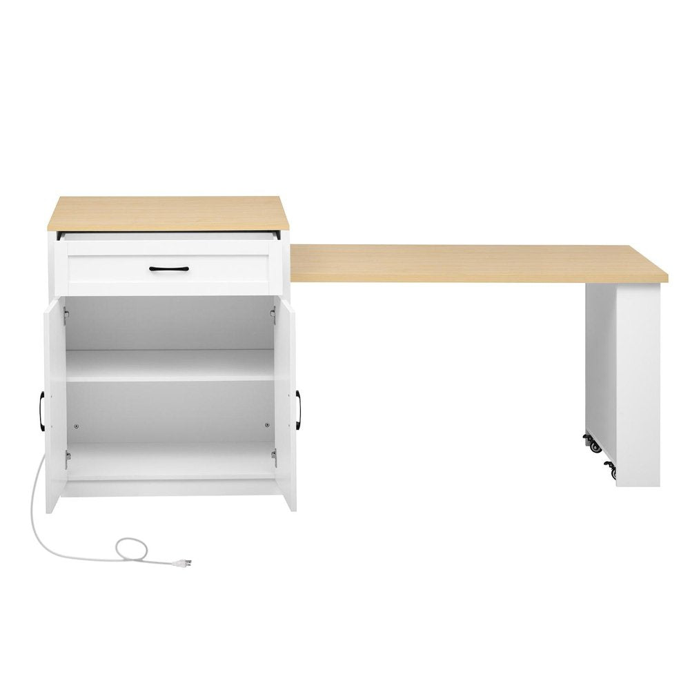 A white kitchen cart with a brown wood top and a flat door cabinet with shelves, with a white extension table on wheels.