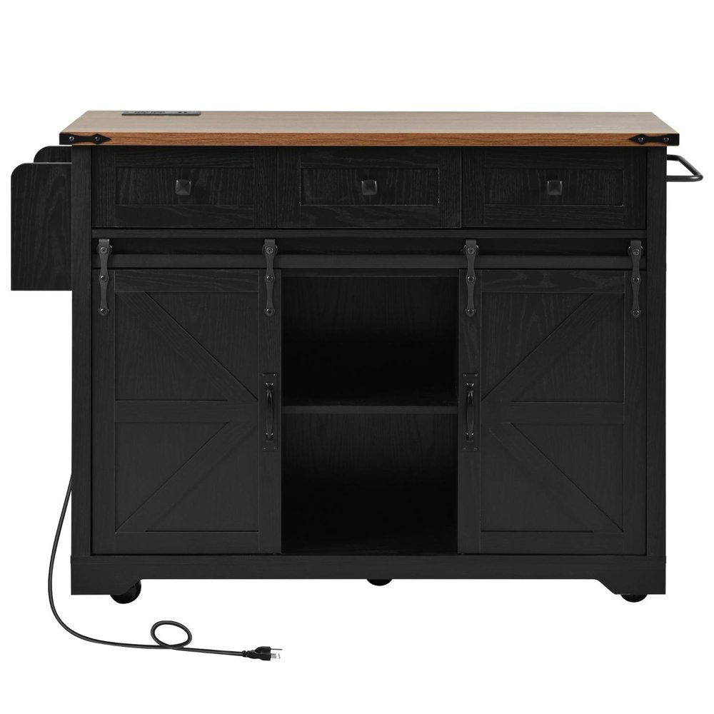 Black wood kitchen cart with a brown wood top, sliding barn doors, three drawers, and wheels.