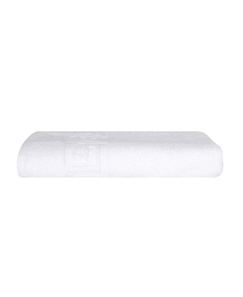White Turkish cotton bath sheet with a Greek key pattern, folded on a white background.