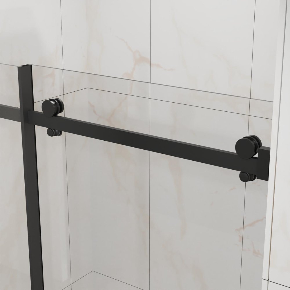 Black framed sliding shower door with clear tempered glass panels against a tiled wall.