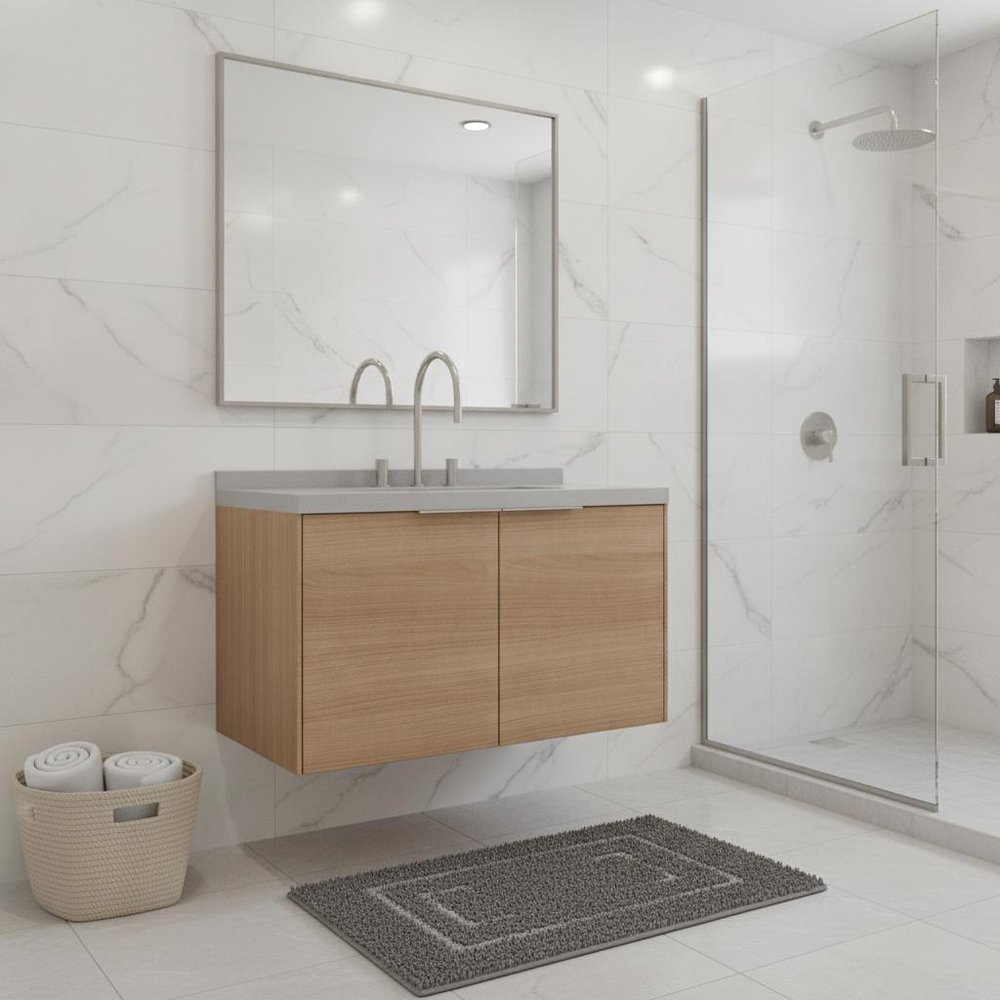 36" brown wood floating double door bathroom vanity with white sink and chrome faucet on white marble tile wall.
