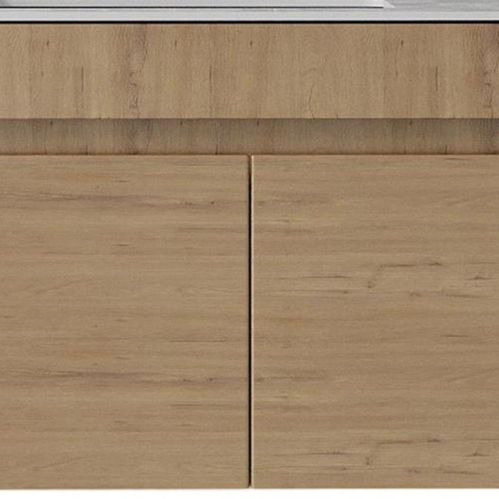 Close-up of a 30-inch brown wood floating double door bathroom vanity with a white sink.